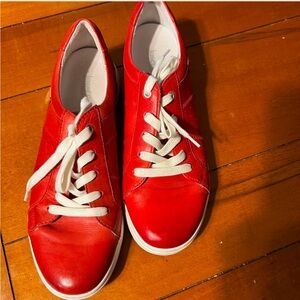 Vibrant Red Low-Top Sneakers with White Laces and Clean White Soles